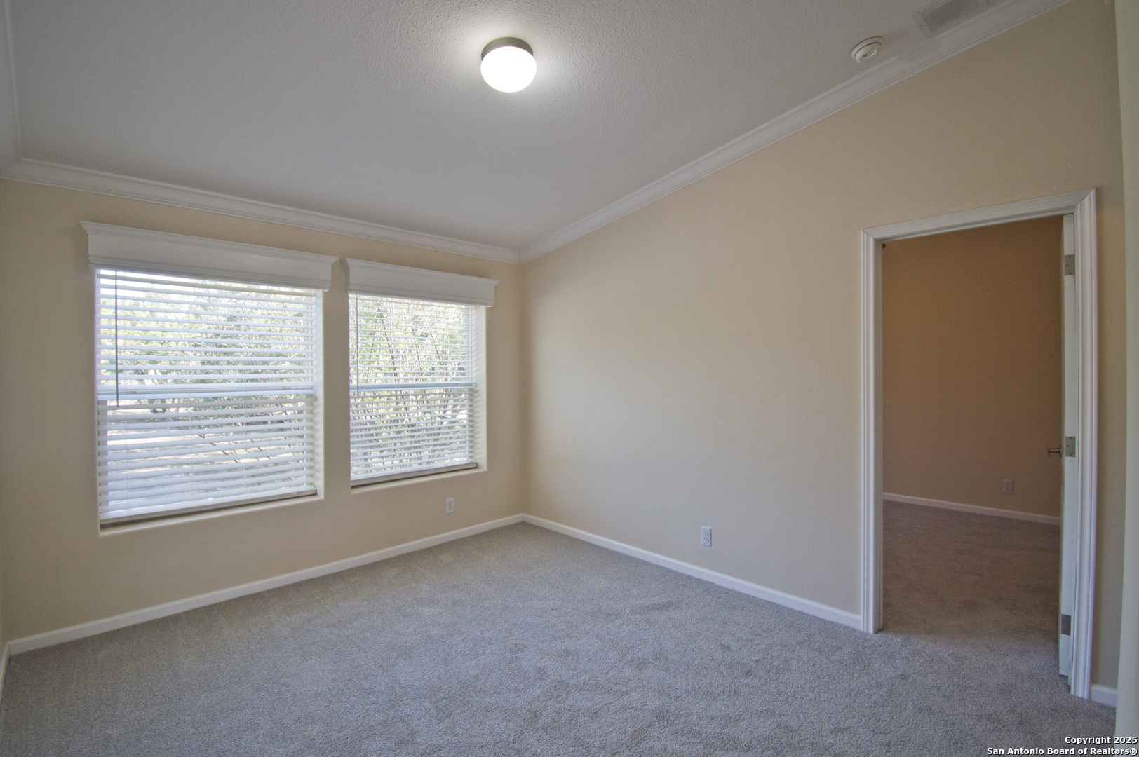 108 Fawn Drive Spring Branch, TX 78070 - Photo 18 of 31 an empty room with windows
