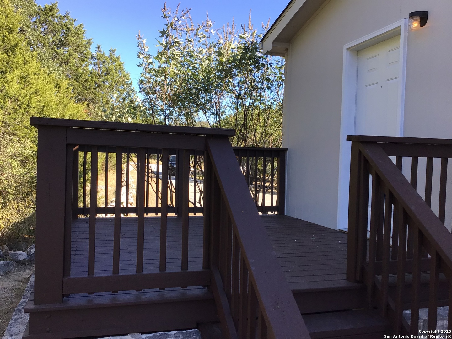 108 Fawn Drive Spring Branch, TX 78070 - Photo 31 of 31 a view of deck with a door and wooden floor