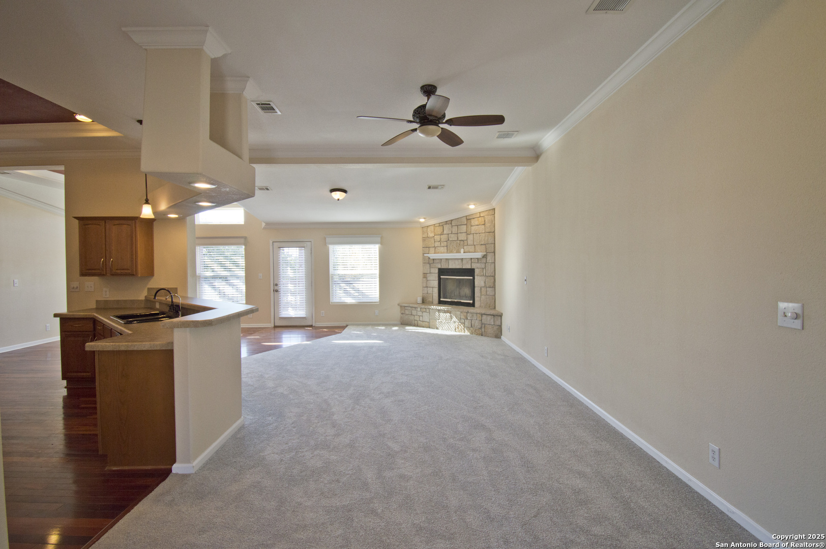 108 Fawn Drive Spring Branch, TX 78070 - Photo 4 of 31 a view of a kitchen with a sink and a stove