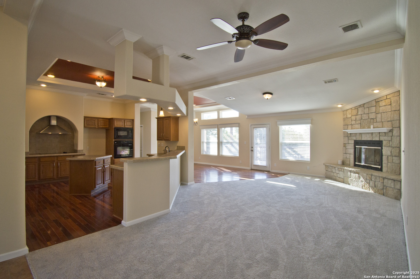 108 Fawn Drive Spring Branch, TX 78070 - Photo 5 of 31 a view of a kitchen with a sink and a refrigerator