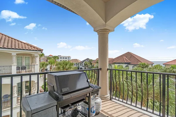 a view of a city from a balcony with outdoor space