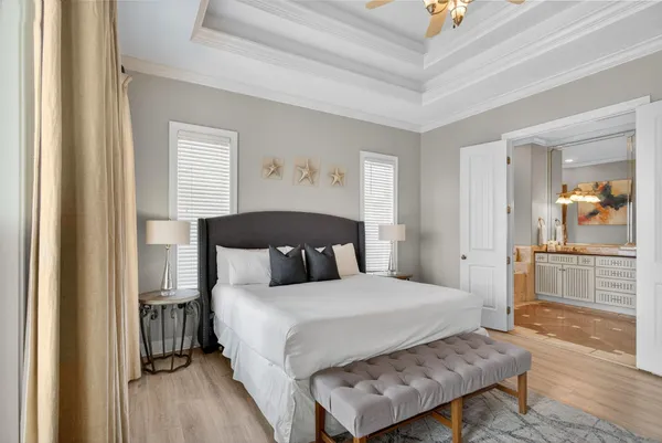 a bathroom with a bathtub and a window