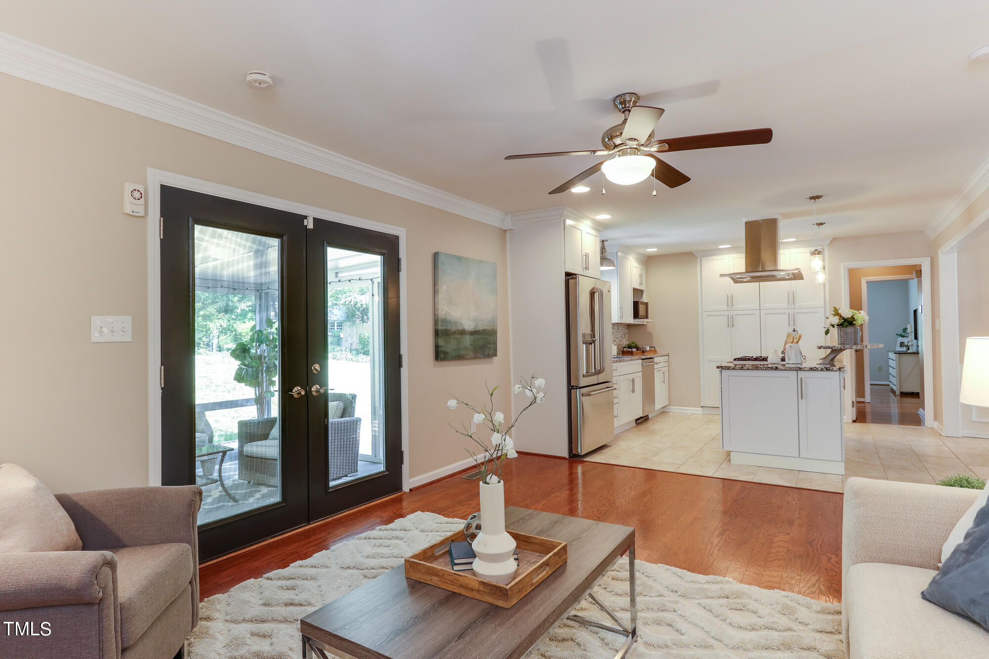 5413 Knollwood Road Raleigh, NC 27609 - Photo 14 of 30 a living room with furniture and a large window