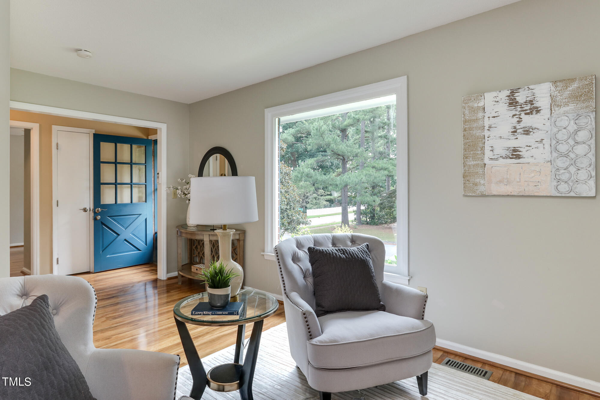 5413 Knollwood Road Raleigh, NC 27609 - Photo 4 of 30 a living room with furniture and a window