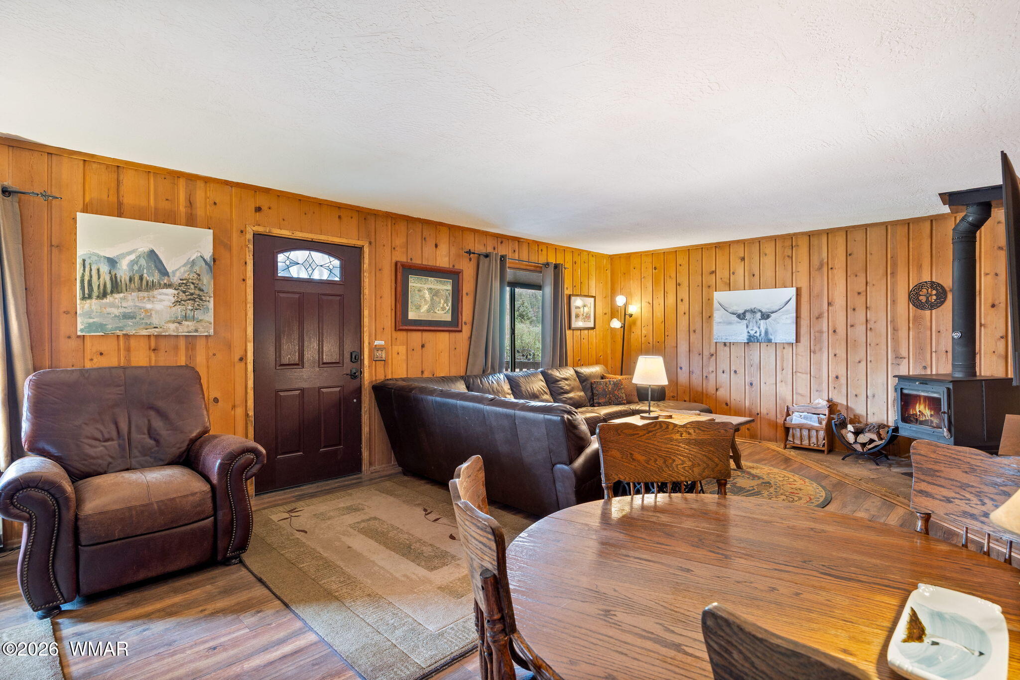 85 Main Street Greer, AZ 85927 - Photo 13 of 55 a living room with furniture and large window