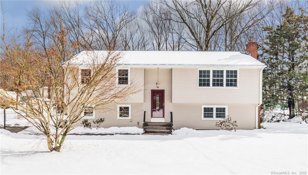 200 Sonstrom Road Bristol, CT 06010 - Photo 1 of 1 a view of a house with a snow in front of it