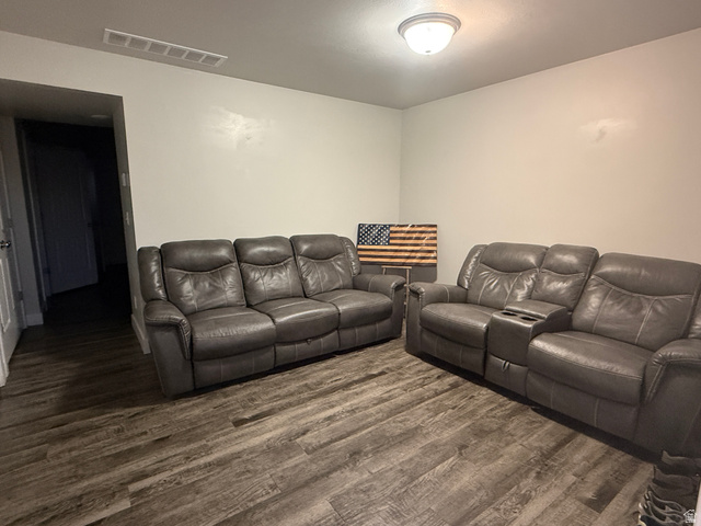 485 370 South Preston, ID 83263 - Photo 4 of 16 Living room featuring dark wood finished floors