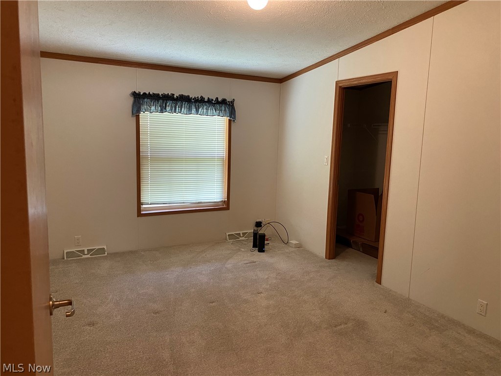 4610 Cleveland Road East, Unit V16 Huron, OH 44839 - Photo 5 of 15 Bedroom Number 1, with a walk in closet.