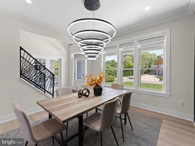 a kitchen with stainless steel appliances a sink stove and refrigerator