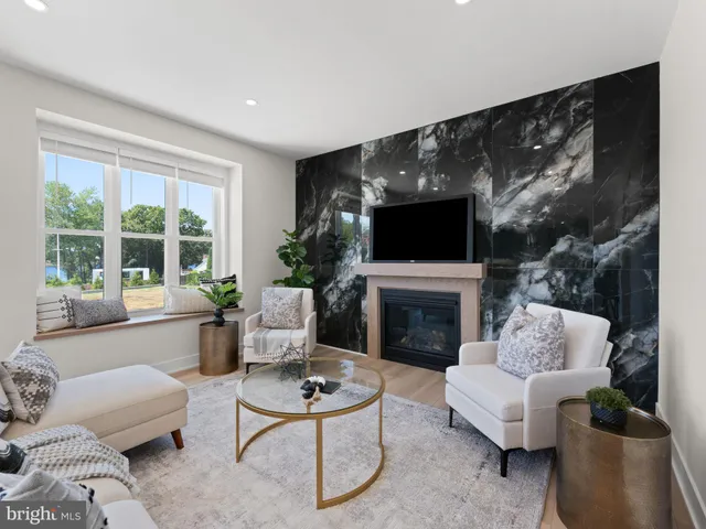 a bathroom with a double vanity sink double mirror and shower