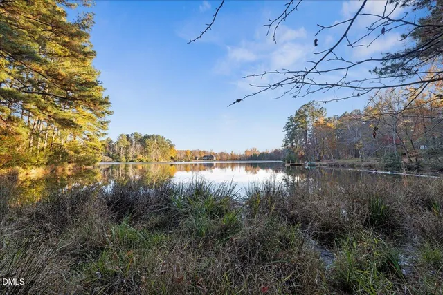 a view of lake with green space