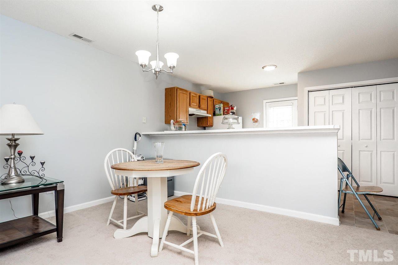 2233 Violet Bluff Court Raleigh, NC 27610 - Photo 3 of 9 Room for a table, + a breakfast bar