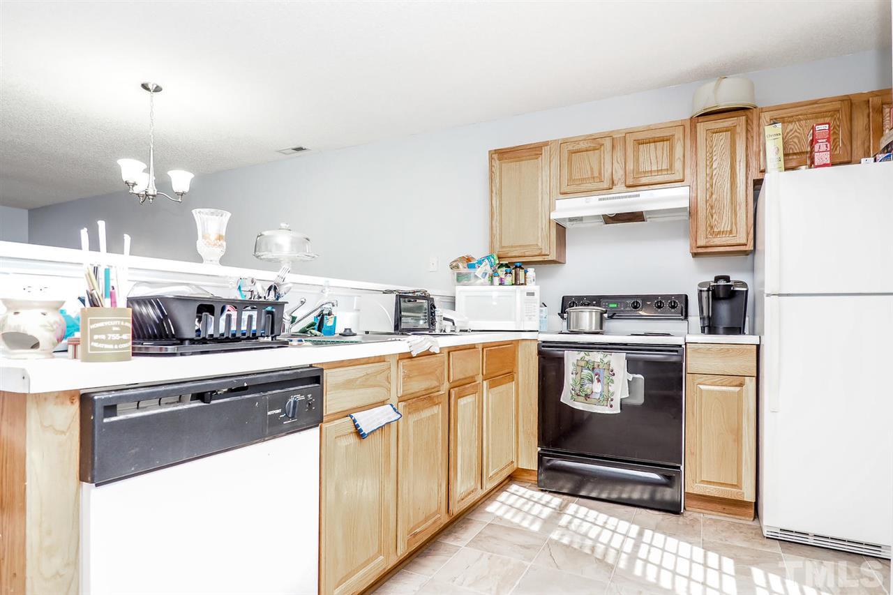2233 Violet Bluff Court Raleigh, NC 27610 - Photo 4 of 9 Open and bright. Refrigerator conveys