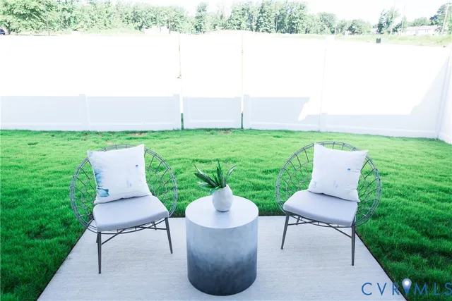 a view of a patio in backyard