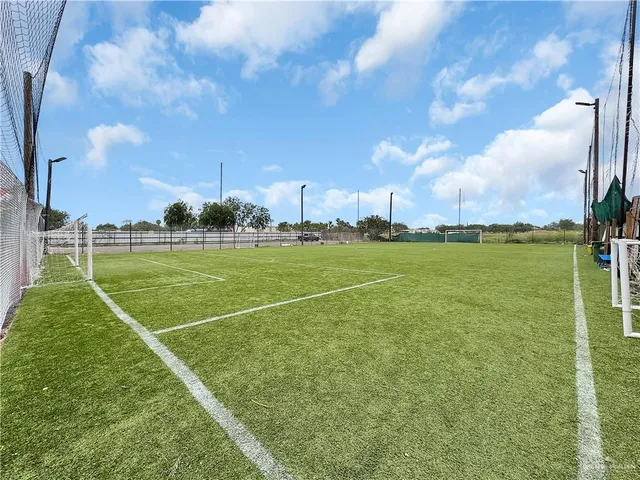 an aerial view of a house with outdoor space