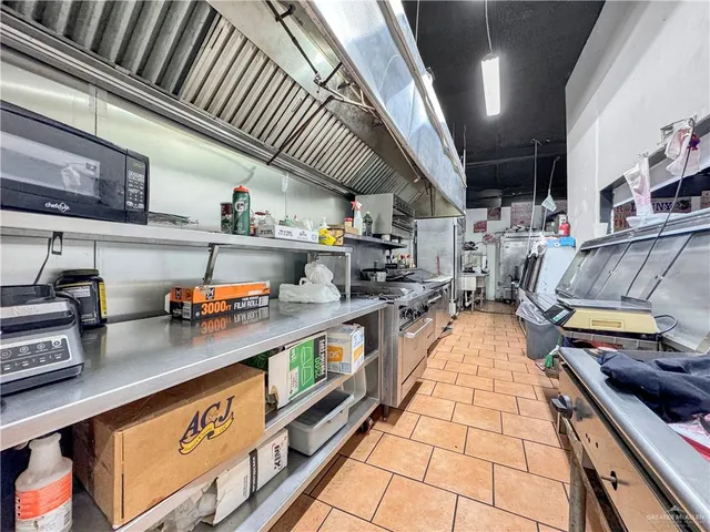 a view of a street with a building