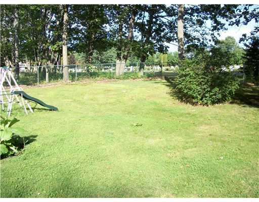 31 Cole Road Biddeford, ME 04005 - Photo 13 of 18 Exterior Back. Large back yard for...