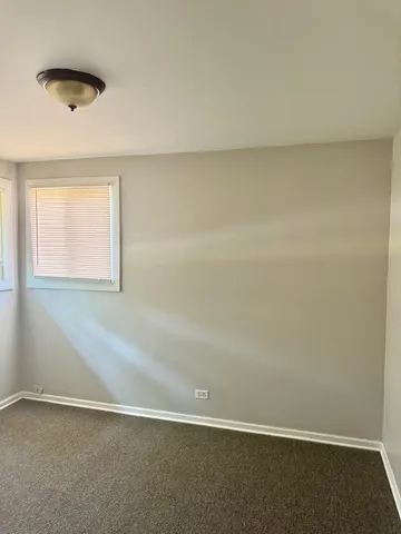 an empty room with a workbench