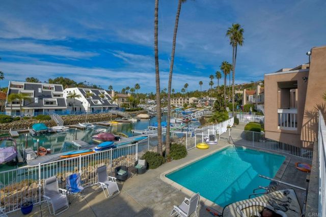 a view of a brick building with large windows