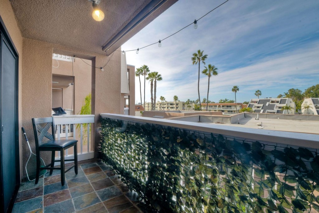 4705 Marina Drive, Unit 5 Carlsbad, CA 92008 - Photo 23 of 30 a bathroom with a sink and a mirror