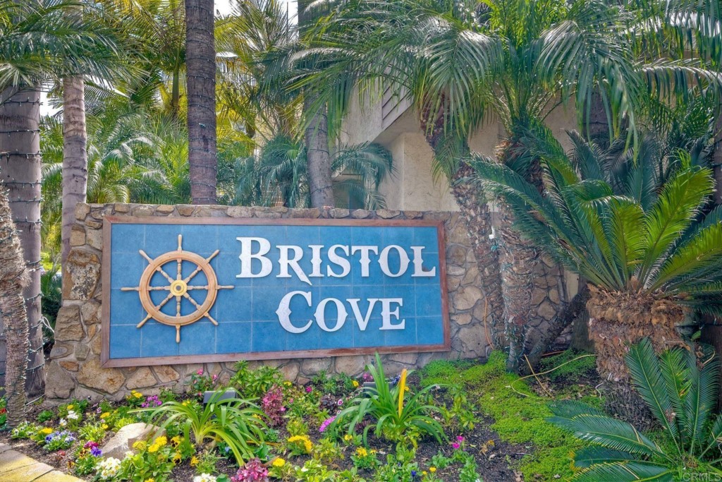 4705 Marina Drive, Unit 5 Carlsbad, CA 92008 - Photo 25 of 30 a sign that is next to a yard