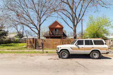 84 Anthony Street Austin, TX 78702 - Photo 3 of 17 a car parked on the side of the road