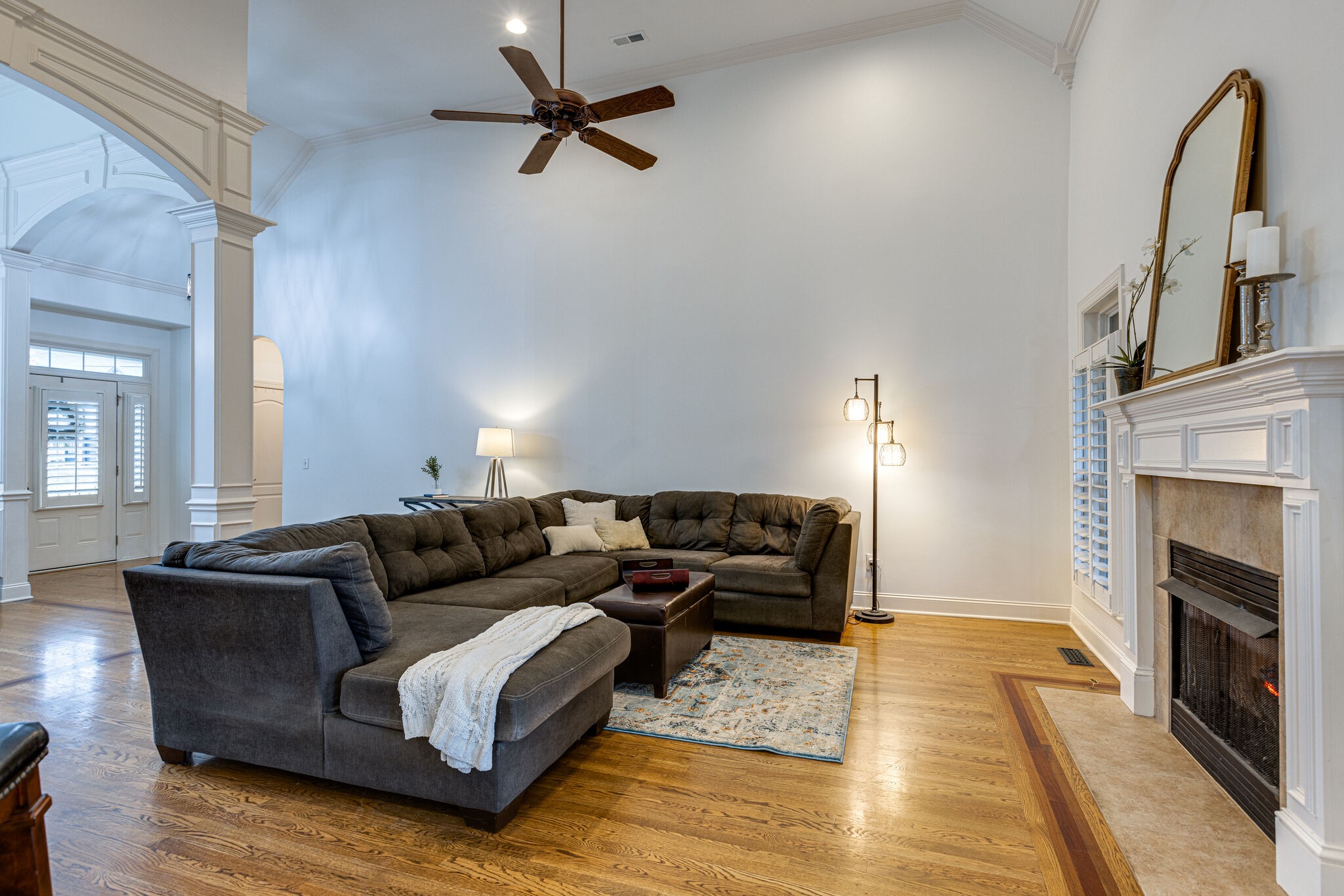 1213 White Rock Road Spring Hill, TN 37174 - Photo 12 of 50 a living room with furniture and a fireplace