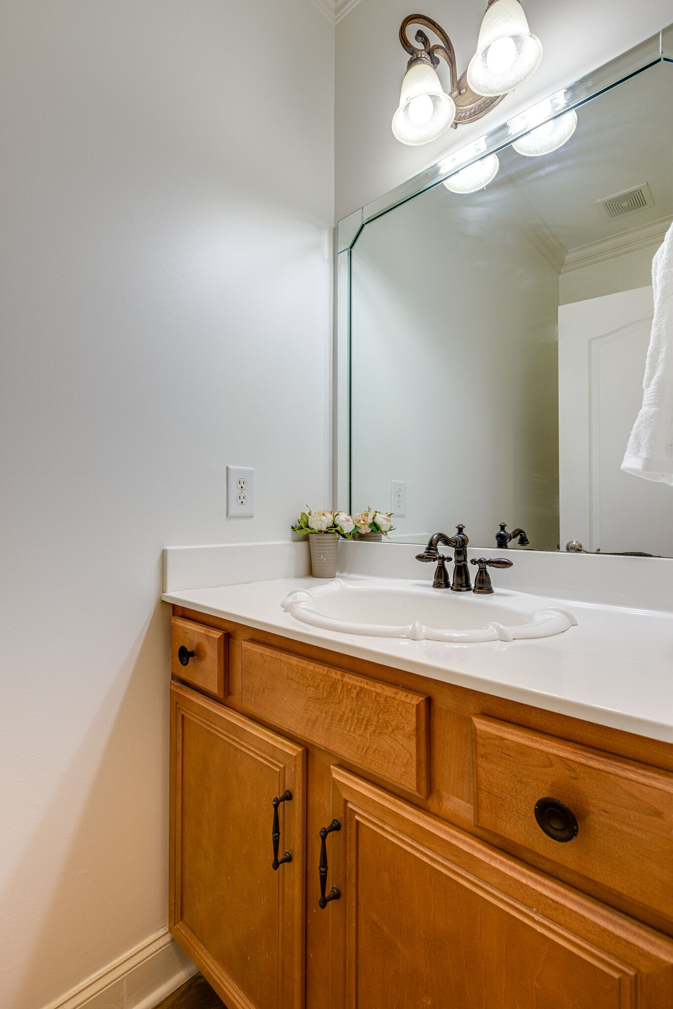 1213 White Rock Road Spring Hill, TN 37174 - Photo 23 of 50 a bathroom with a sink and a mirror