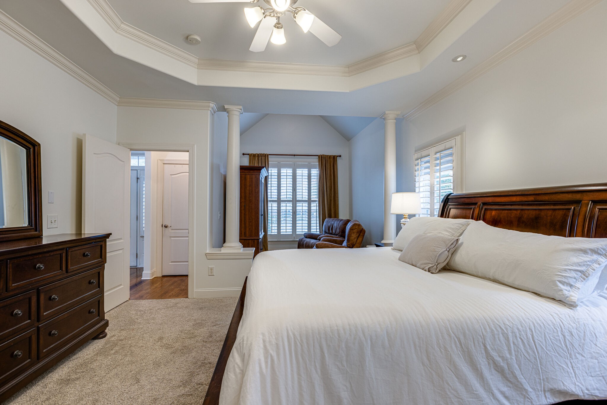 1213 White Rock Road Spring Hill, TN 37174 - Photo 26 of 50 a bedroom with a bed and dresser with mirror