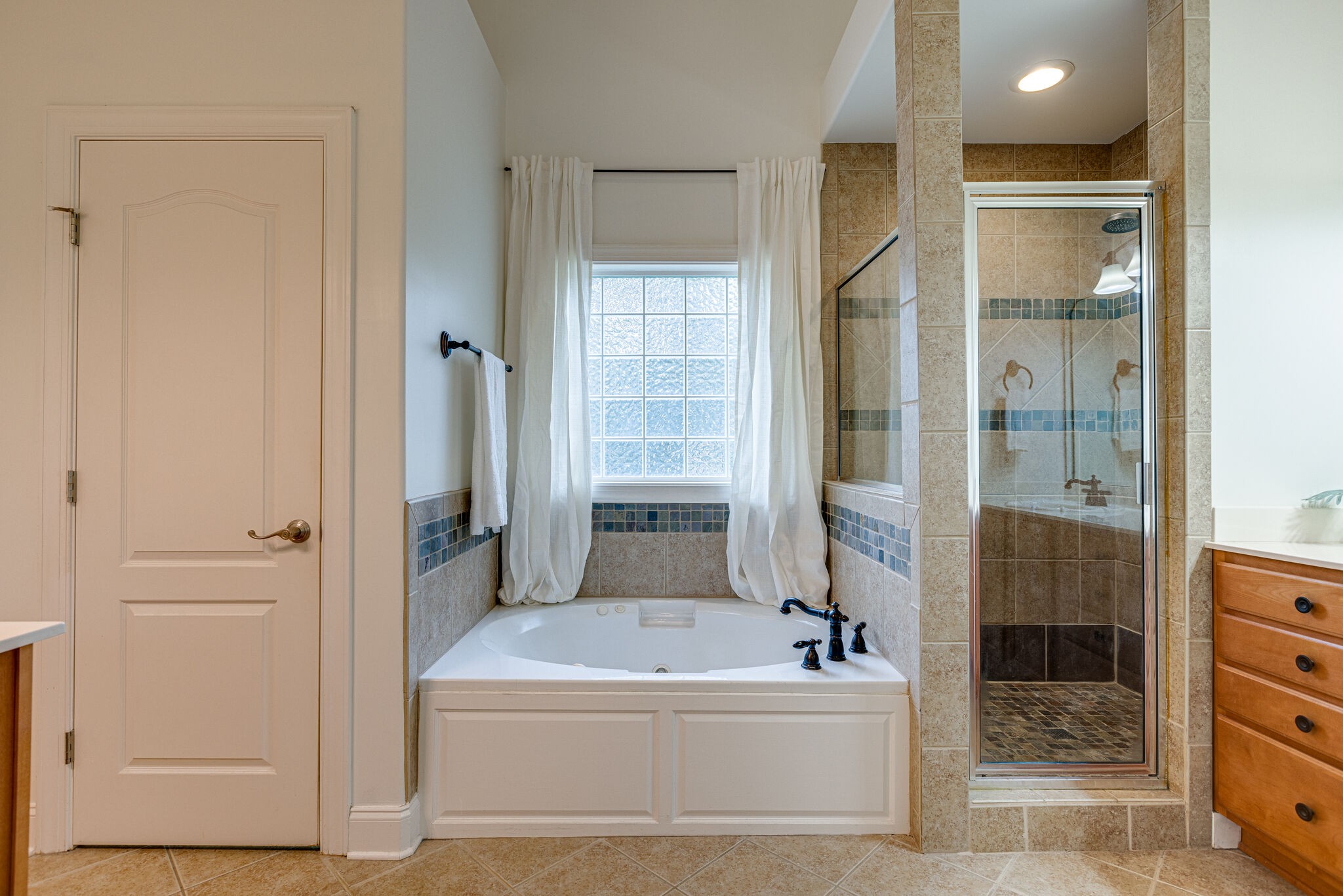 1213 White Rock Road Spring Hill, TN 37174 - Photo 28 of 50 a bathroom with a tub and shower