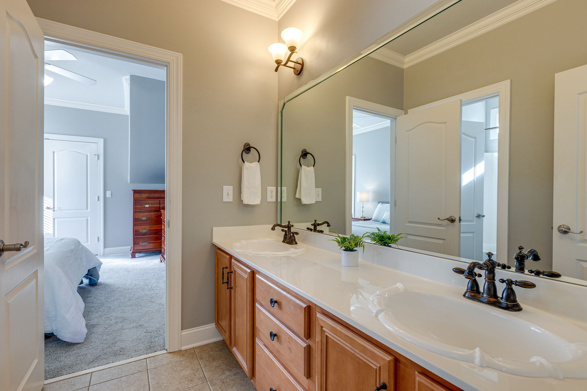1213 White Rock Road Spring Hill, TN 37174 - Photo 33 of 50 a bathroom with double vanity sinks and a mirror