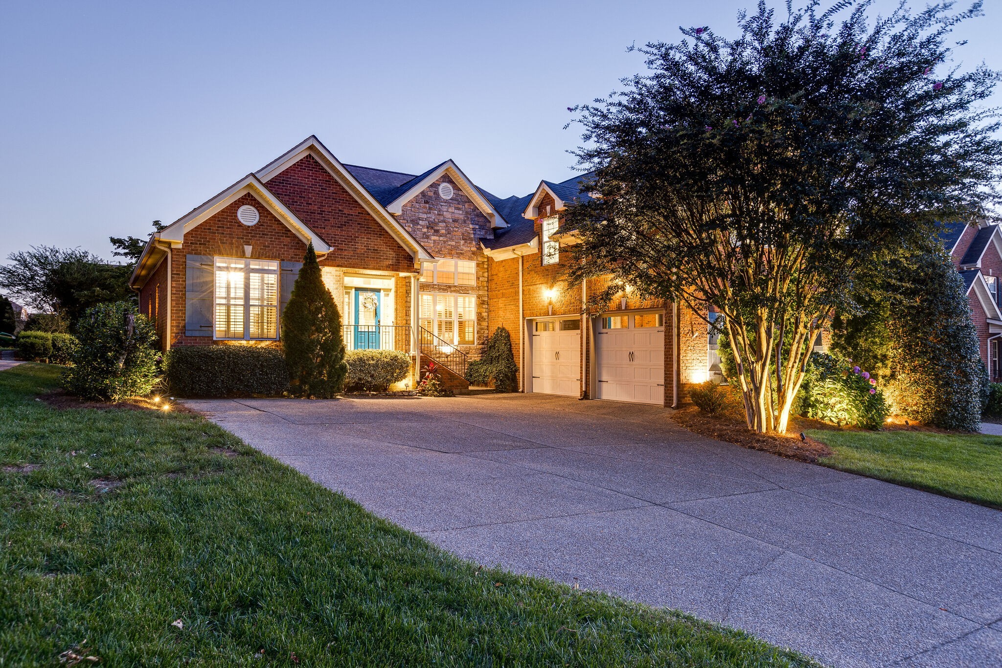1213 White Rock Road Spring Hill, TN 37174 - Photo 4 of 50 a front view of a house with a yard and garage