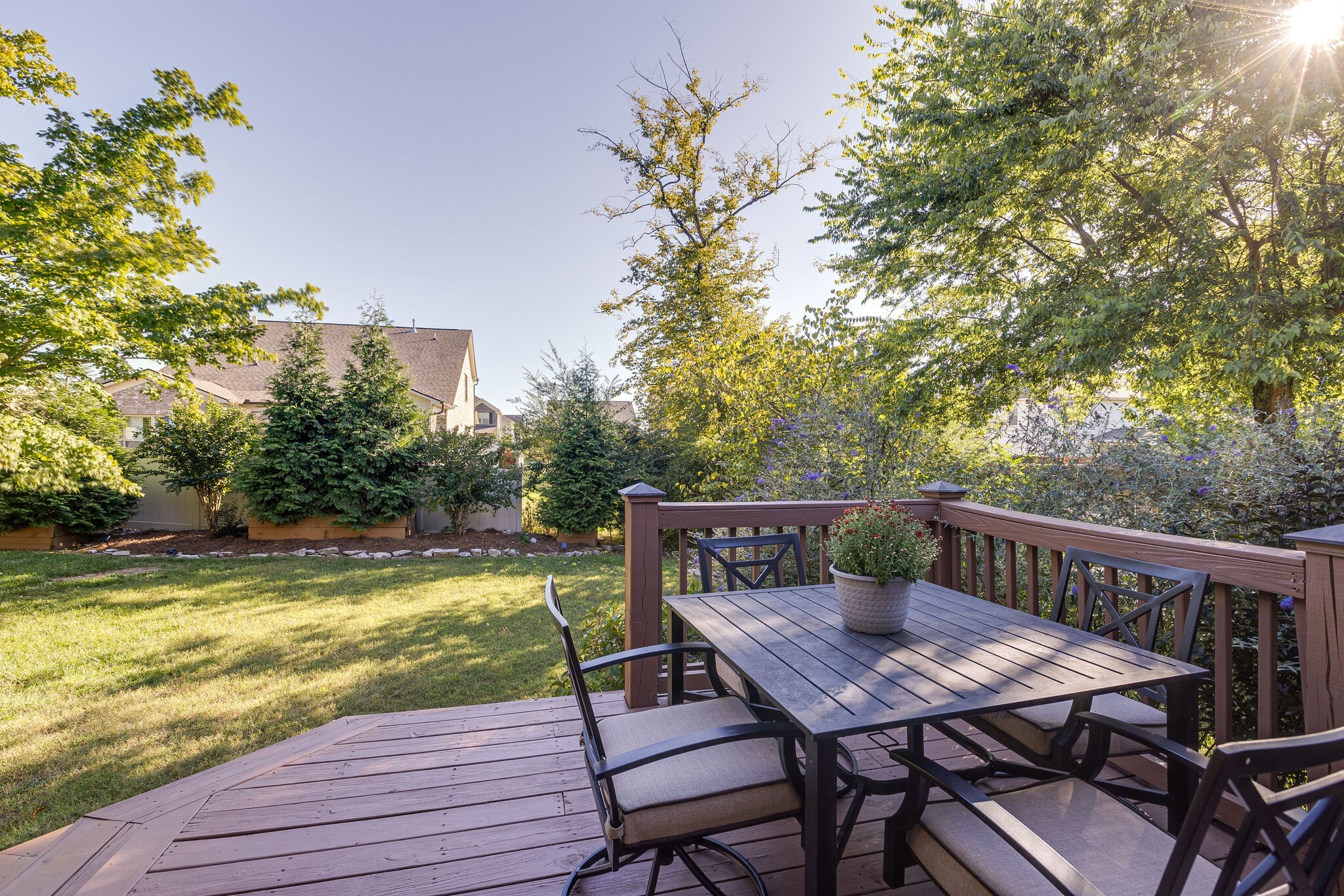 1213 White Rock Road Spring Hill, TN 37174 - Photo 41 of 50 a view of a deck with a table and chairs with wooden floor and fence
