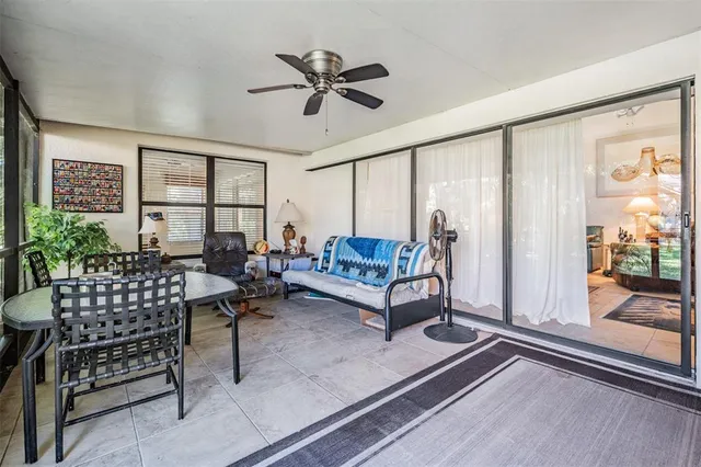 an aerial view of a house with garden space and street view