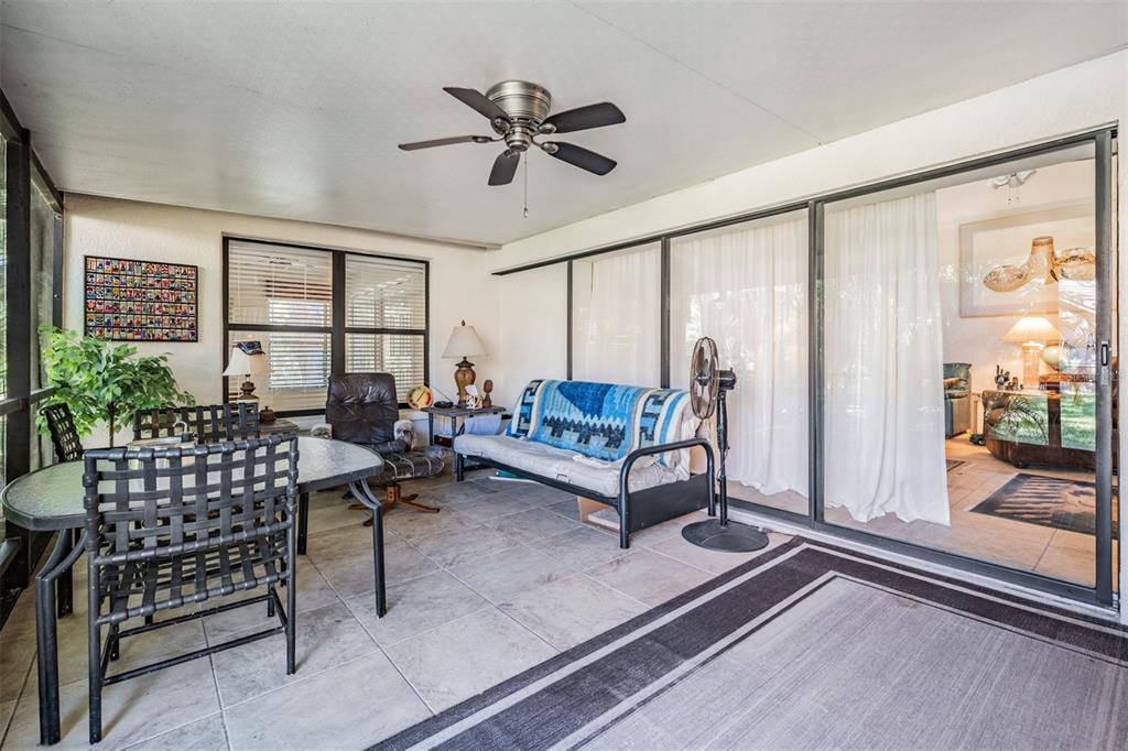 17569 Fairmeadow Drive Tampa, FL 33647 - Photo 26 of 60 a living room with furniture and wooden floor