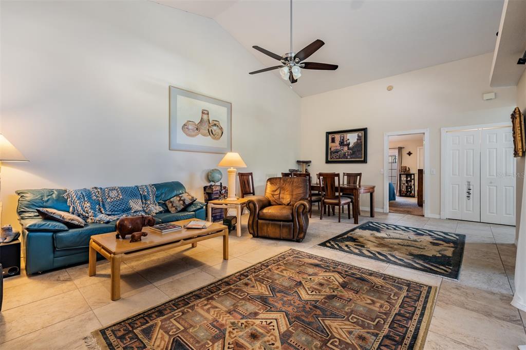 17569 Fairmeadow Drive Tampa, FL 33647 - Photo 9 of 60 a living room with furniture and a rug