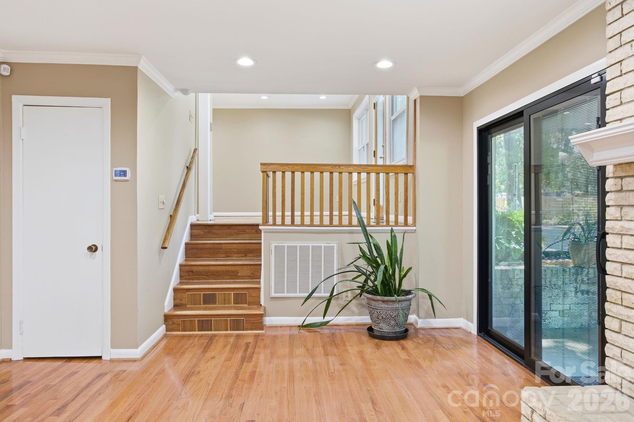 225 Stonewall Road Salisbury, NC 28144 - Photo 12 of 48 a view of an entryway with wooden floor and a potted plant