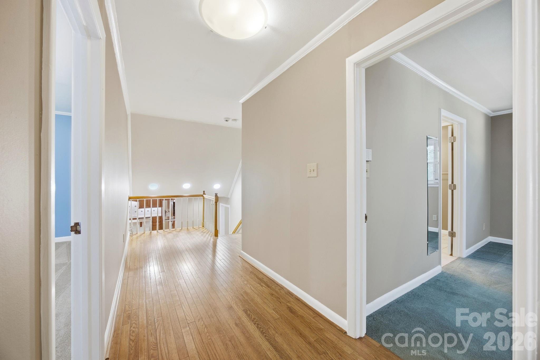 225 Stonewall Road Salisbury, NC 28144 - Photo 27 of 48 a view of a hallway with wooden floor windows