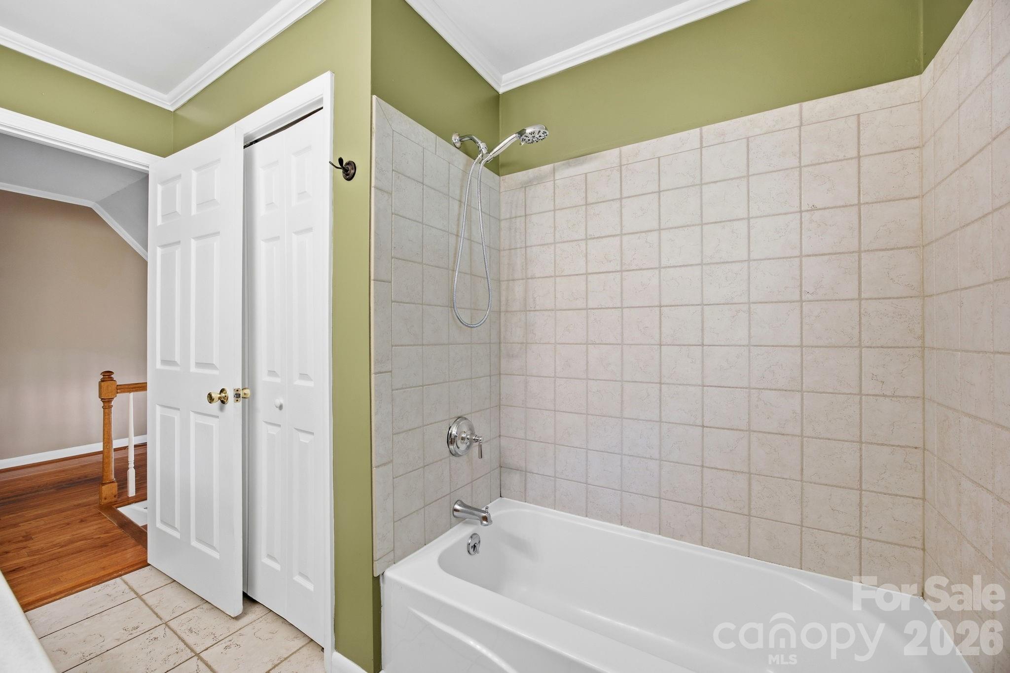 225 Stonewall Road Salisbury, NC 28144 - Photo 34 of 48 a bathroom with a bathtub and shower