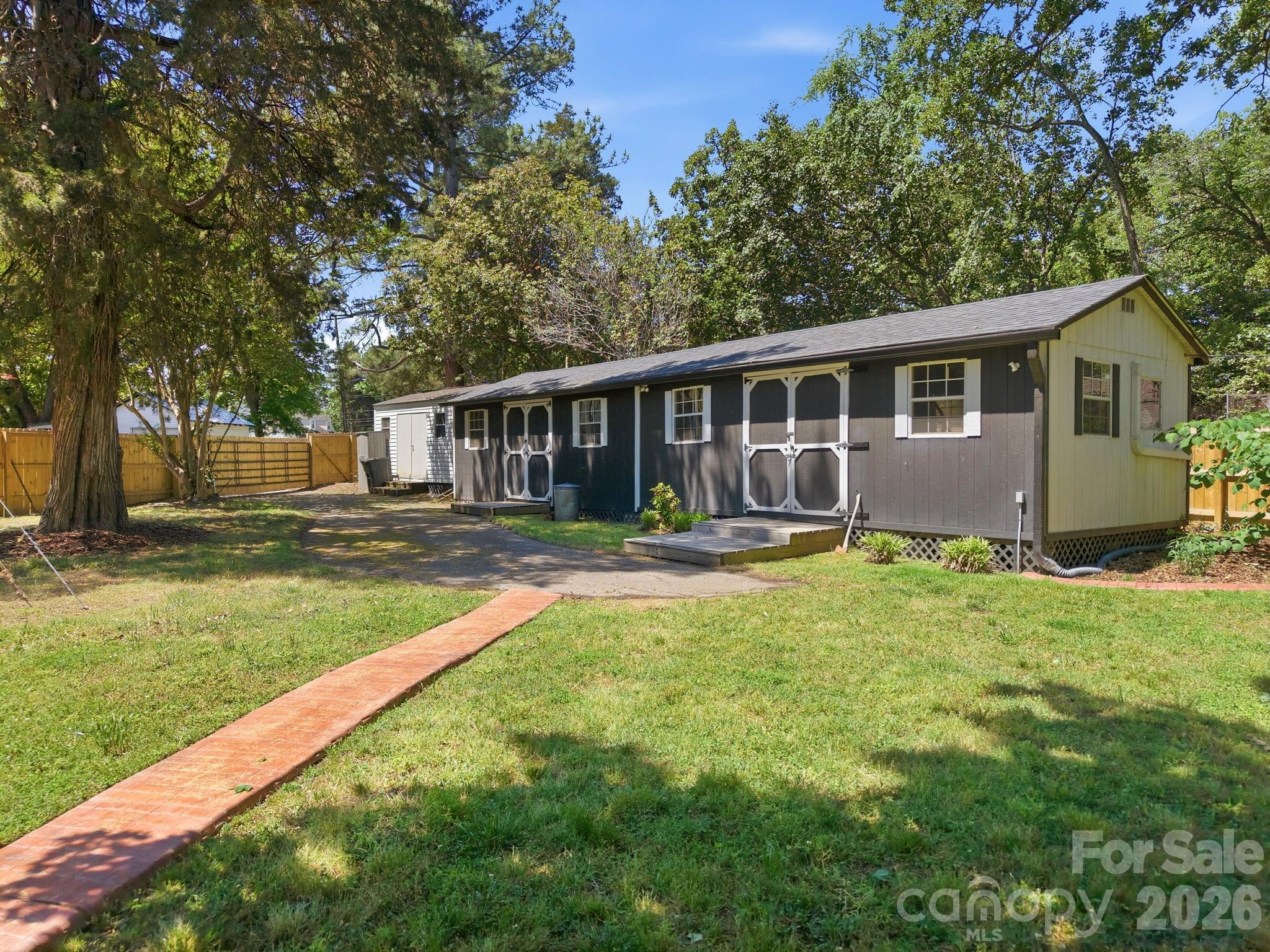 225 Stonewall Road Salisbury, NC 28144 - Photo 41 of 48 a view of a house with backyard and sitting area