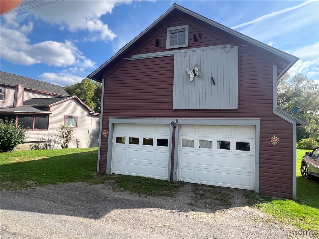 1720 Little York Crossing Road Homer, NY 13077 - Photo 36 of 49 2 car garage with 3 stories and remote door opener