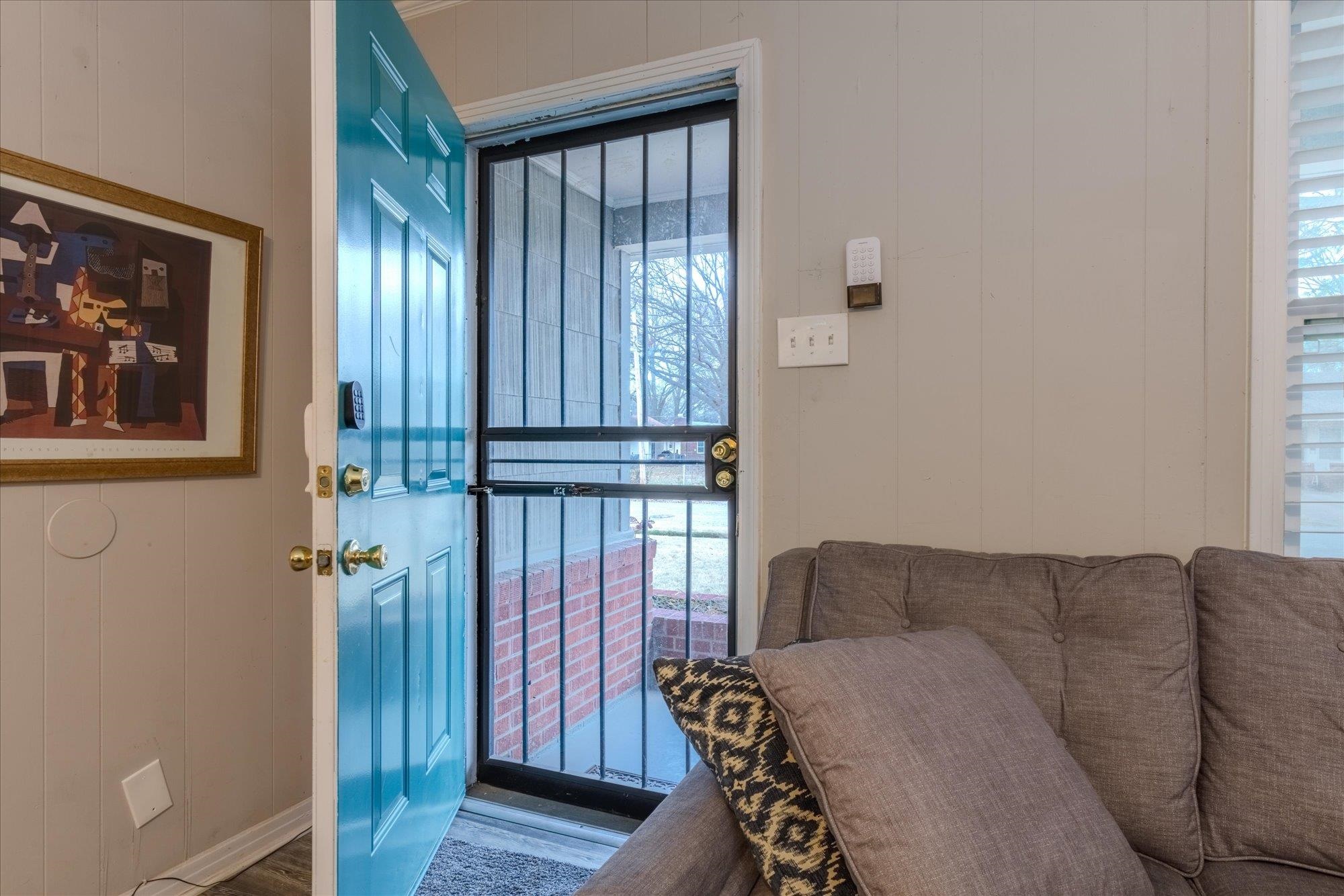 1493 Raymore Road Memphis, TN 38117 - Photo 5 of 27 a living room with furniture and a window