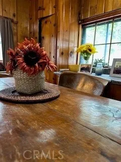 a view of a living room and dining room