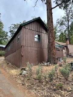52358 Elder Road, Unit 52 Big Creek, CA 93605 - Photo 2 of 41 a backyard of a house with lots of green space