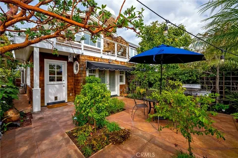 a house view with a garden space