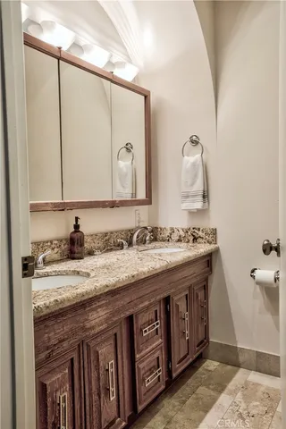 a view of a livingroom with furniture and a flat screen tv