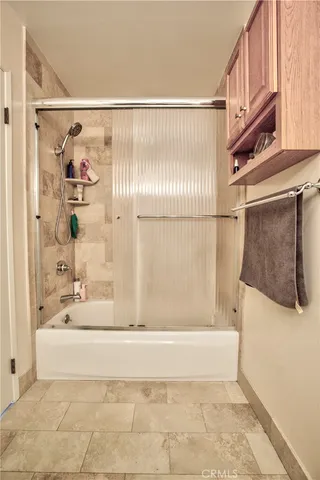 a room with furniture and wooden floor