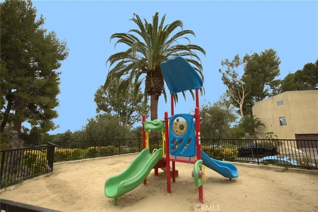 a utility room with sink dryer and washer