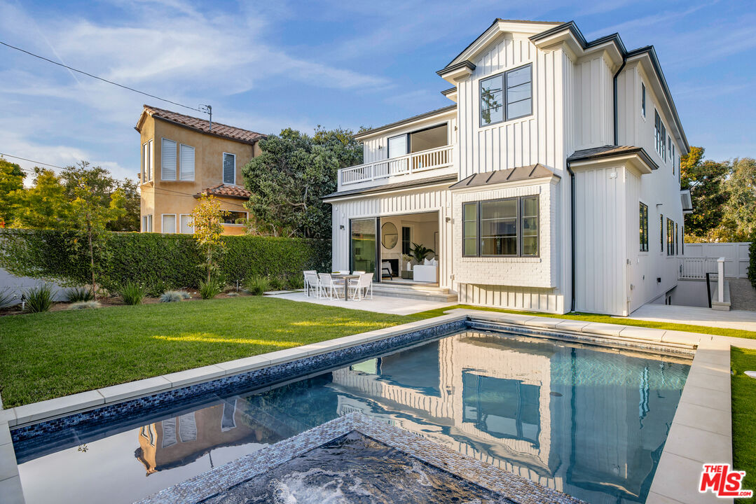 628 10th Street Santa Monica, CA 90402 - Photo 13 of 48 a view of a house with a swimming pool