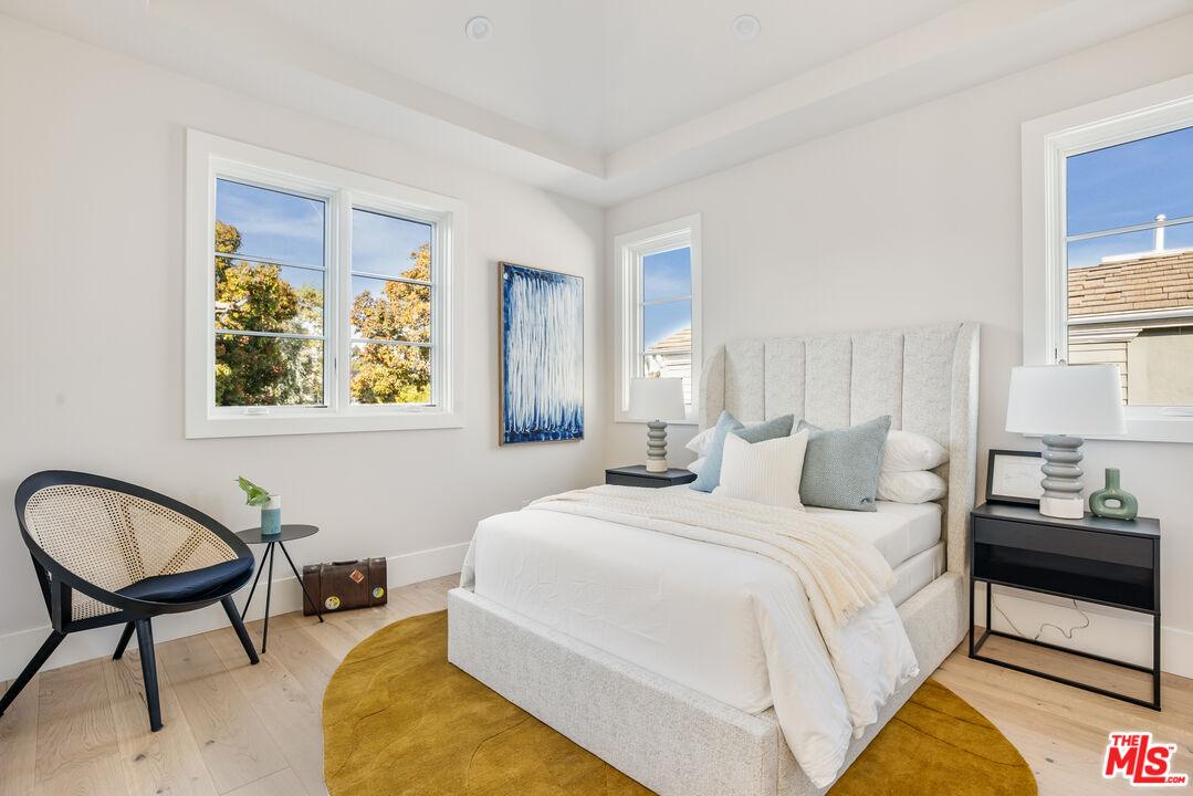 628 10th Street Santa Monica, CA 90402 - Photo 24 of 48 a bedroom with bed and a window